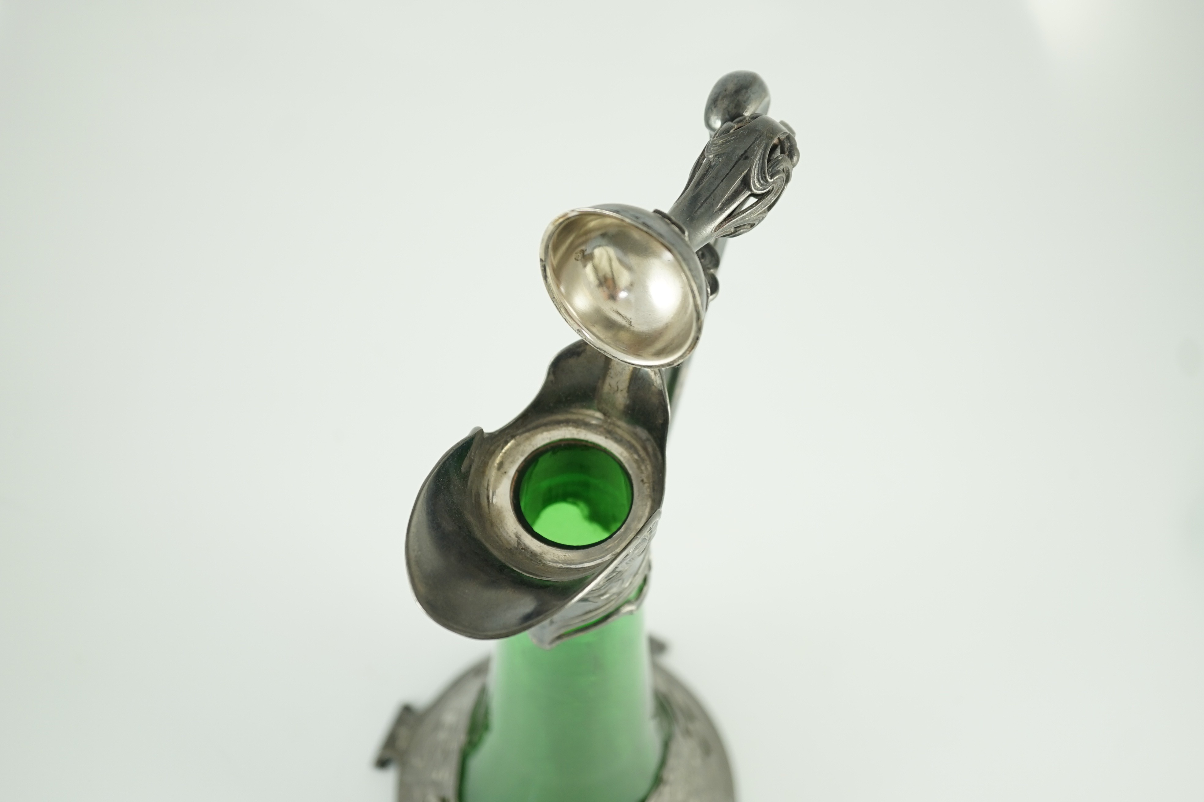 An Art Nouveau WMF metal mounted green glass ewer, c.1905, 40.5cm high